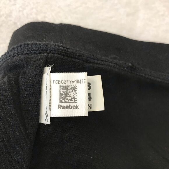 Reebok Women's L Strappy Criss Cross Sports Bra Solid Black Basic Gym Workout - Picture 2 of 6